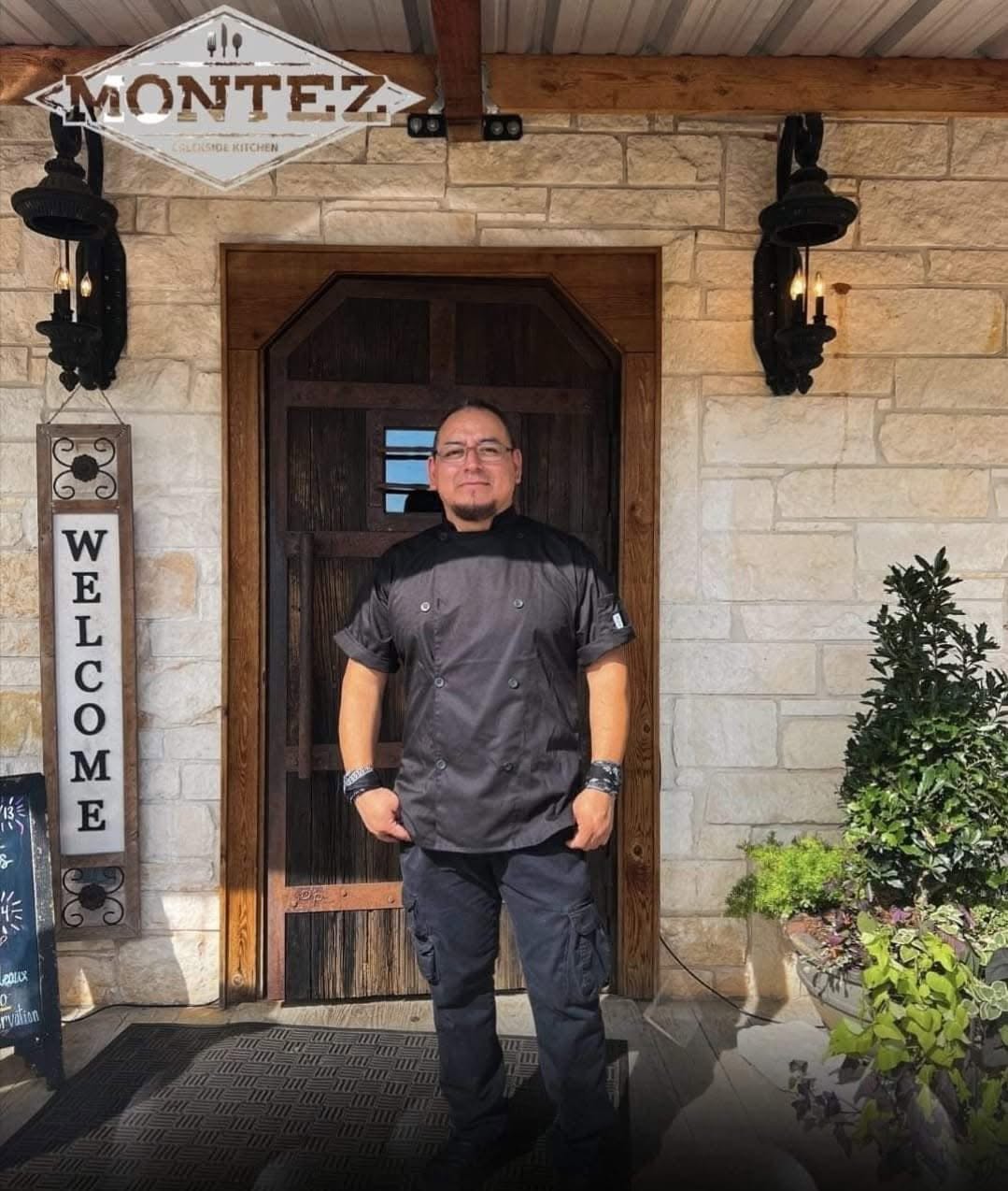 Chef Larios at the entrance to Montez Creekside Kitchen